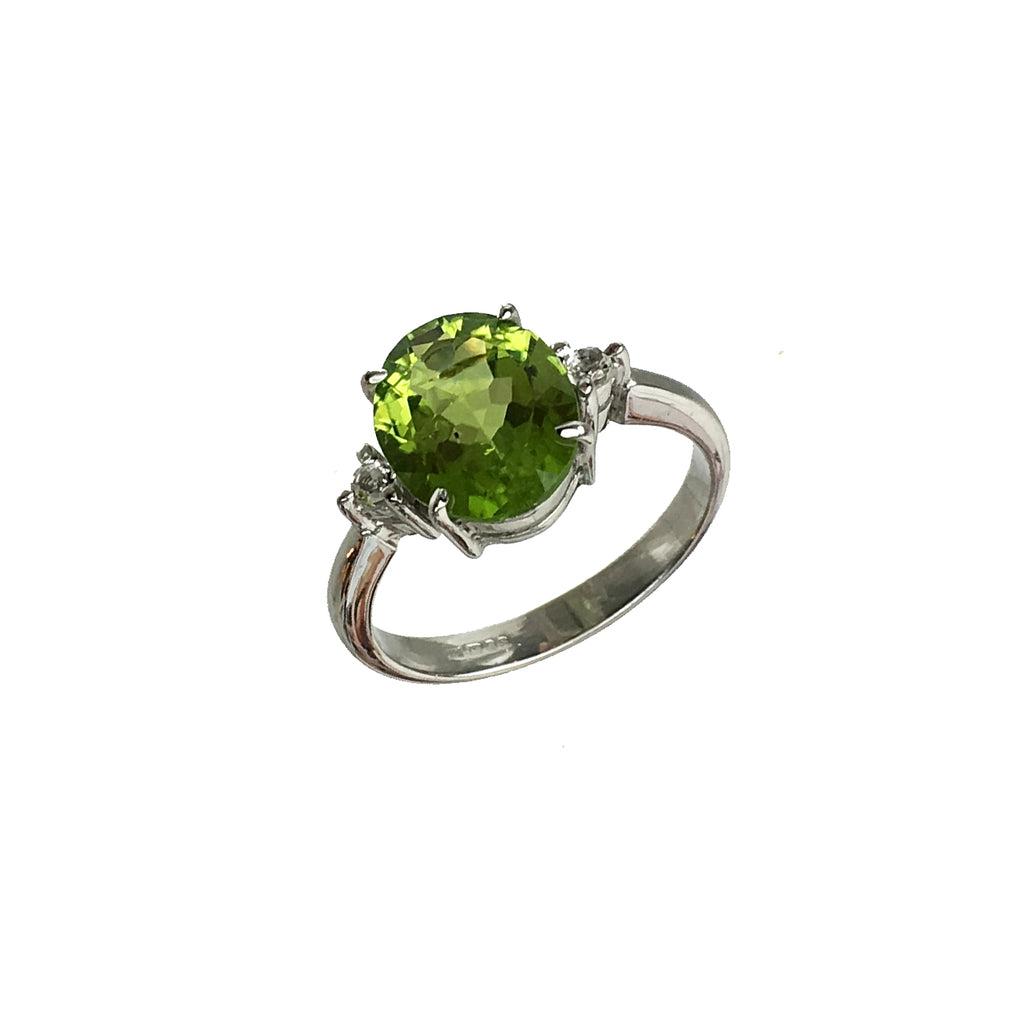Oval Cut Peridot Green and White Topaz Ring - www.sparklingjewellery.com