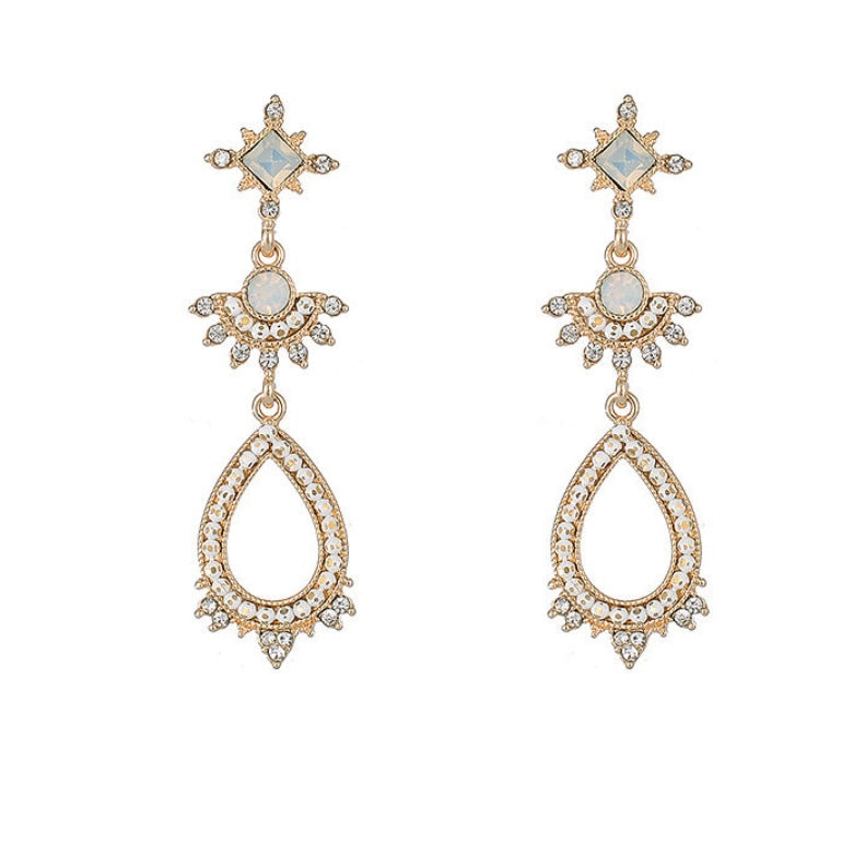 Long Gold Earrings with Green Gems - www.sparklingjewellery.com